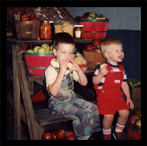 Joel and Zach Pritchett on the cider mill steps