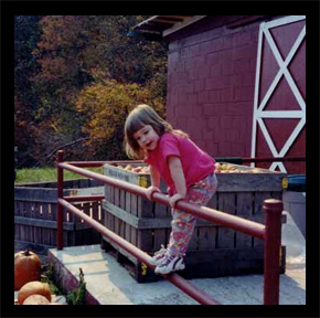 Breann Pritchett on the dock of the Red Apple Barn