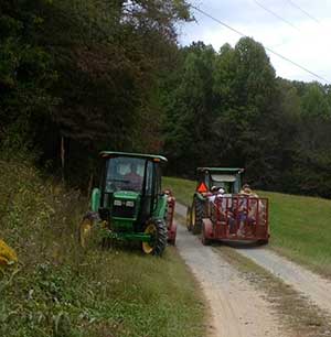 Tractors and wagons meet in the road